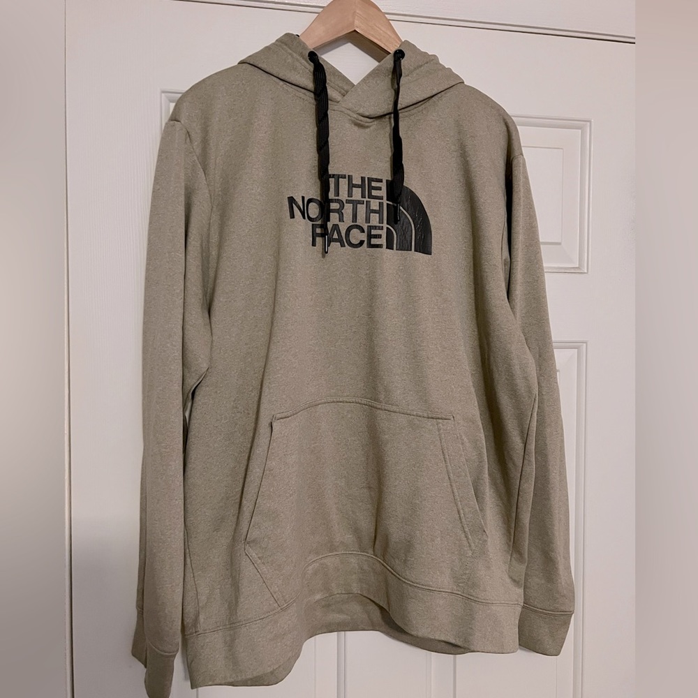 North Face hoodie. Tan with grey lettering.  Great used condition.